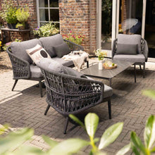 Load image into Gallery viewer, Styled Florence rope outdoor furniture set with chairs, sofa, and table on a patio