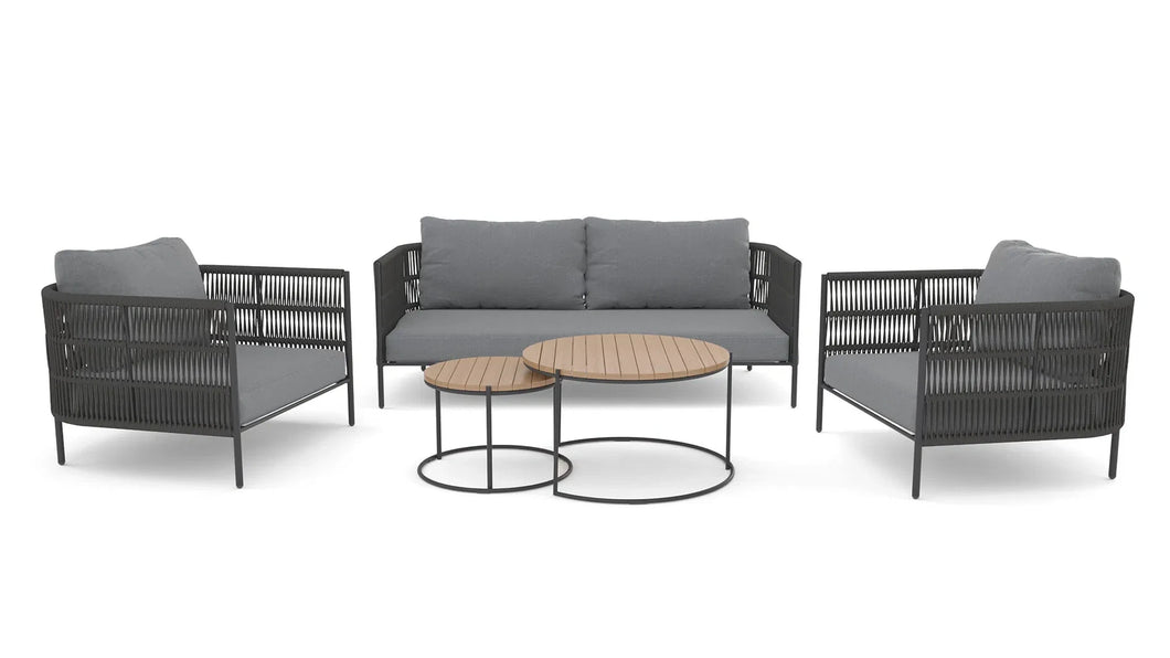 Zenith outdoor patio sofa set in a scenic outdoor garden setting with handwoven rope and glass top table